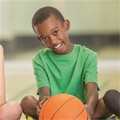 Young boy holding a basketball